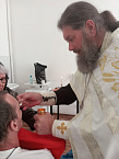 Зауральский  священник совершил Крещение пациентов хосписа в селе Садовое